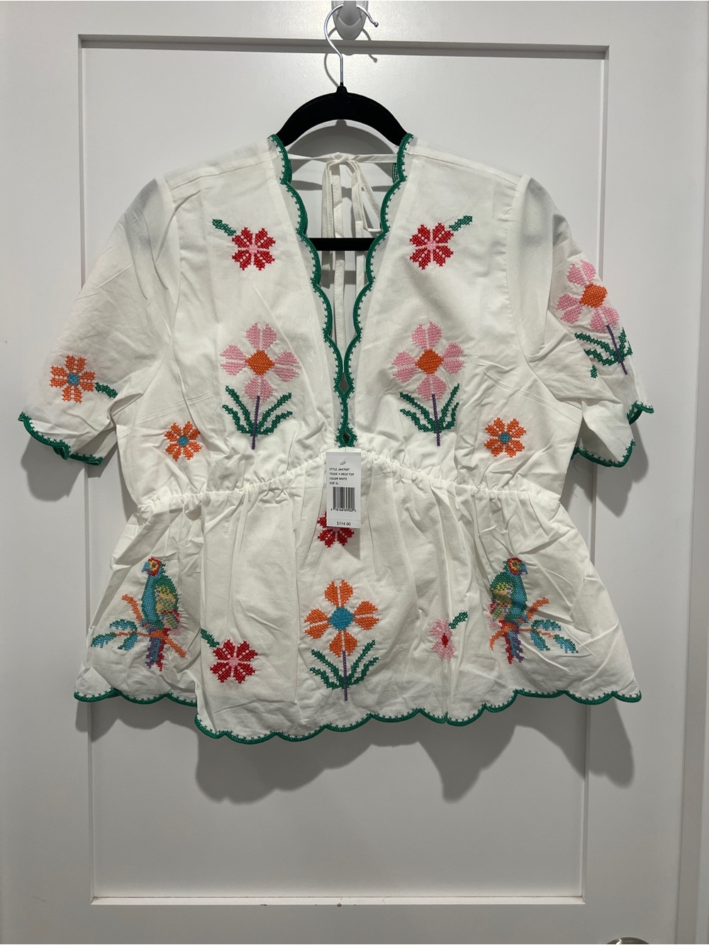 White Embroidered Peplum Blouse with Multicolor Floral & Bird Motif J.Marie